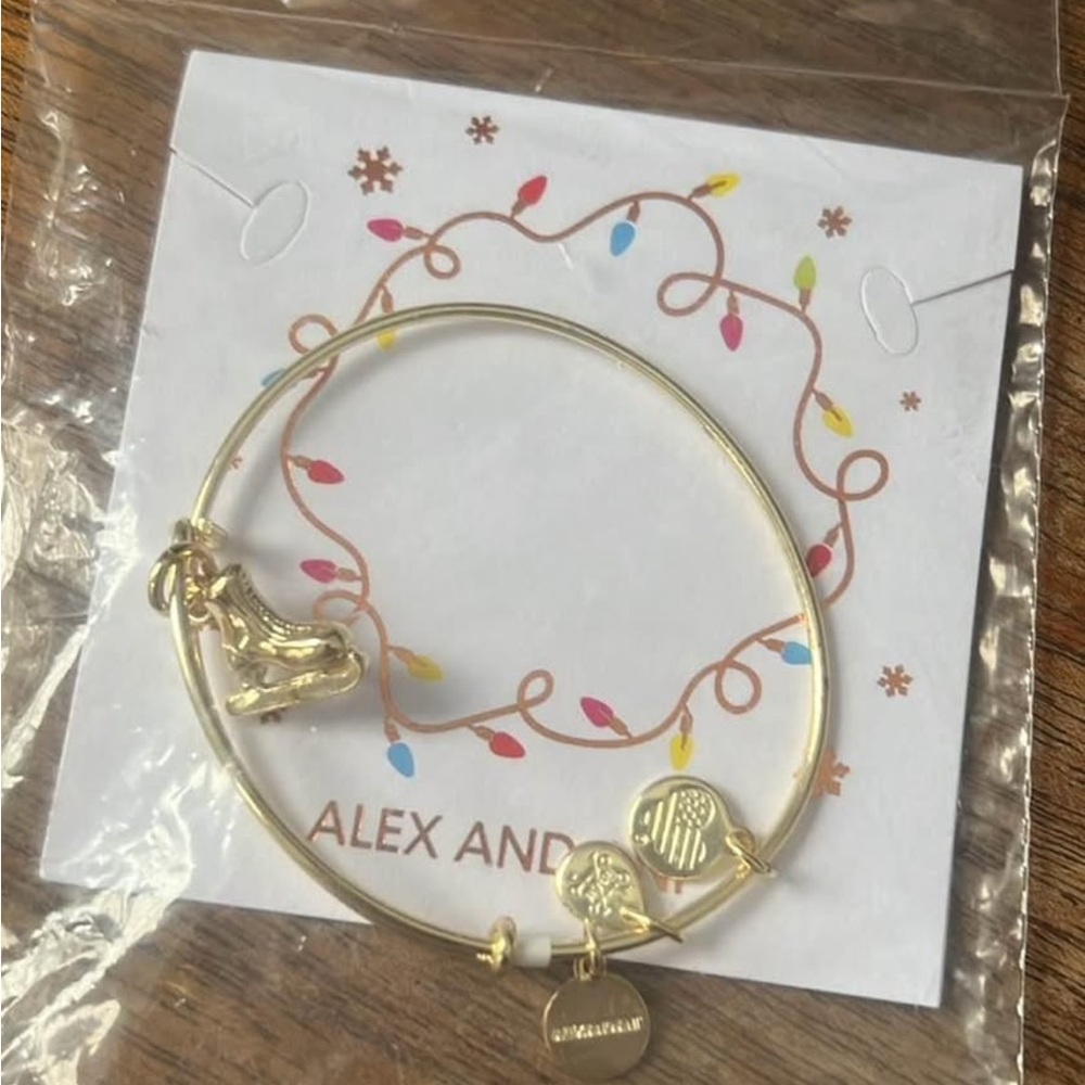 Alex and Ani gold brand new ice skating bracelet bangle